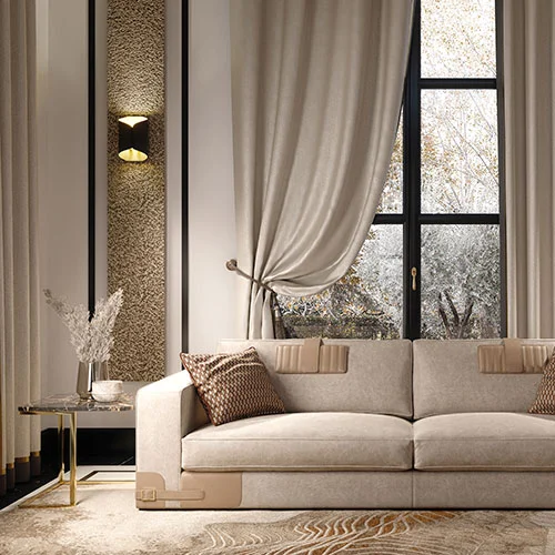A beige velvet 5 seater sofa in contemporary style. Behind it is a glass window, with elegant curtains. 