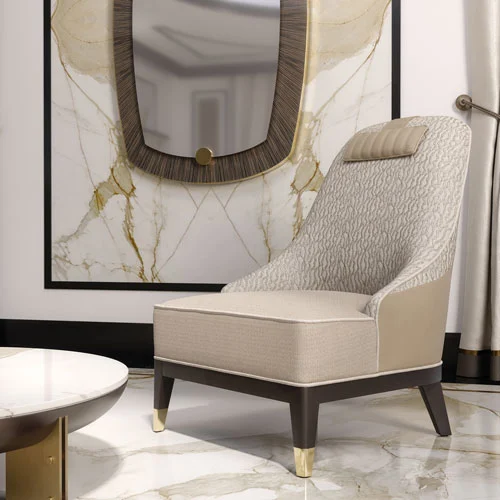 A beige velvet and leather armchair in contemporary style next to a designer oblong mirror with Ebony Macassar frame.  