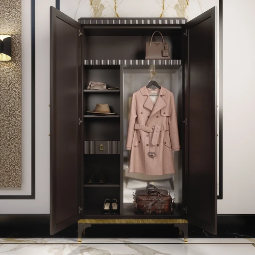 In the two-door, open, elegant wooden wardrobe, Lorien stores a coat, a leather handbag, shoes, a hat and other clothes.